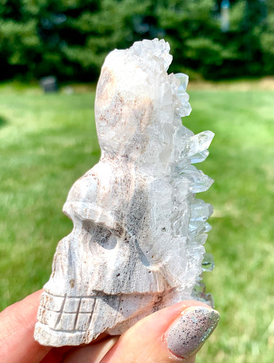 Carved Skull with Clear Quartz